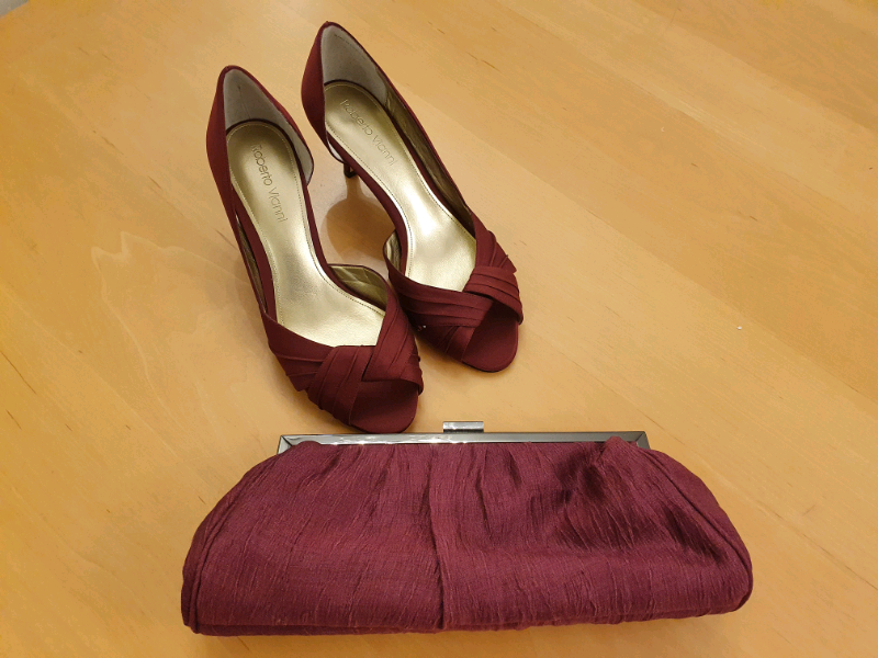 burgundy shoes and clutch bag